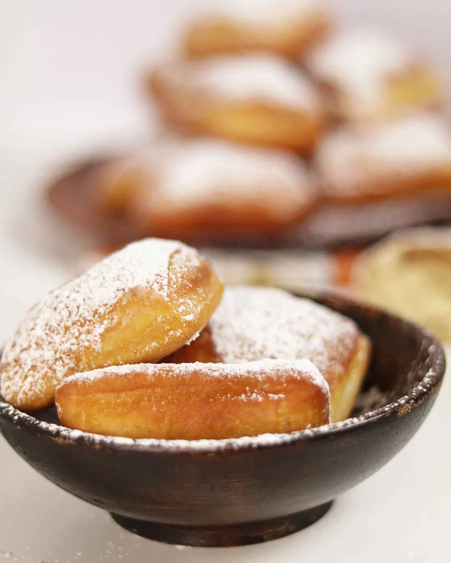 Beignets dusted with powdered sugar